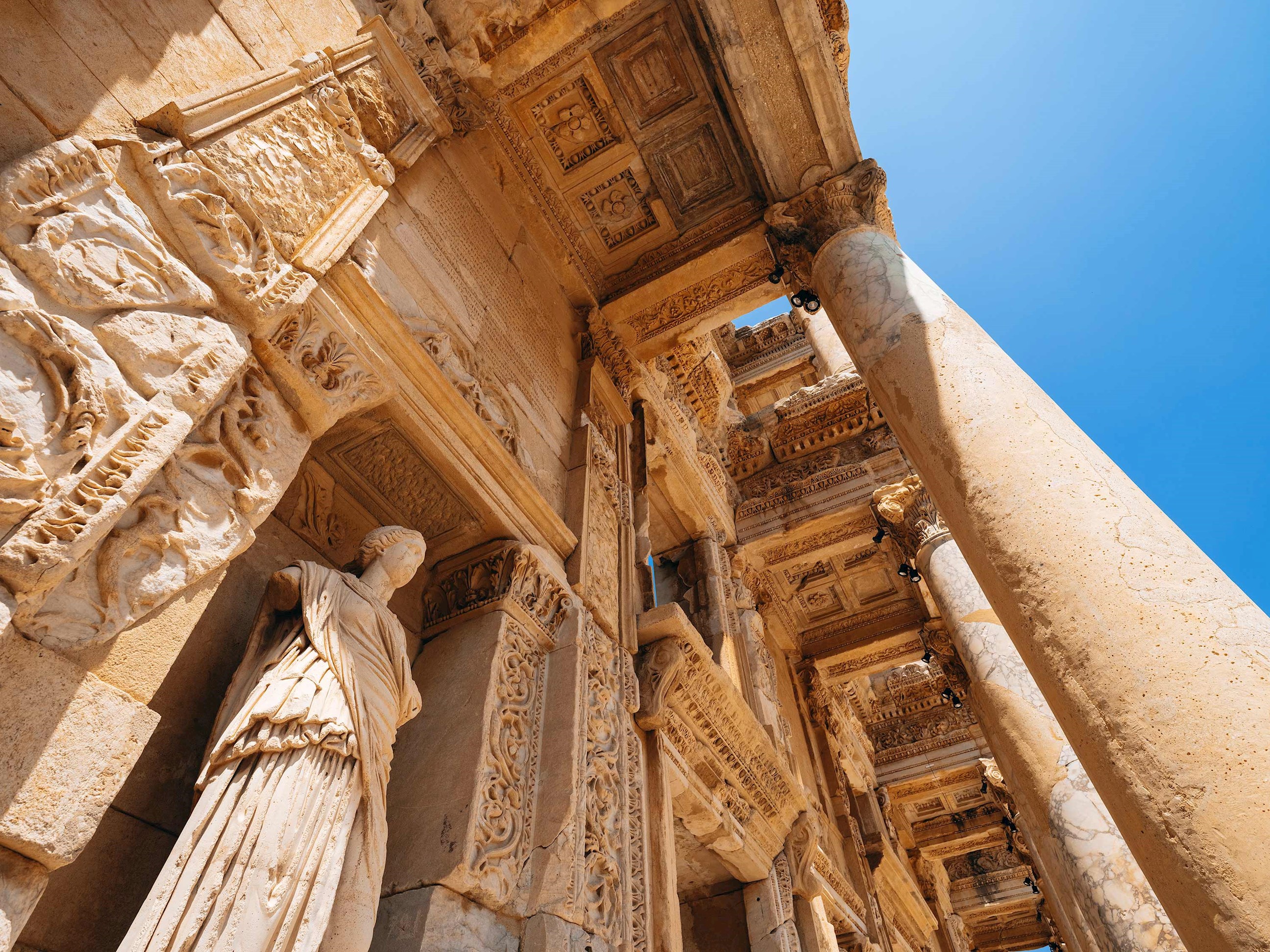 Detailed stone carvings and columns of ancient Library of Celsus in Ephesus, Turkey