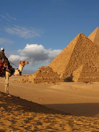Egypt pyramind, and a man on a camel