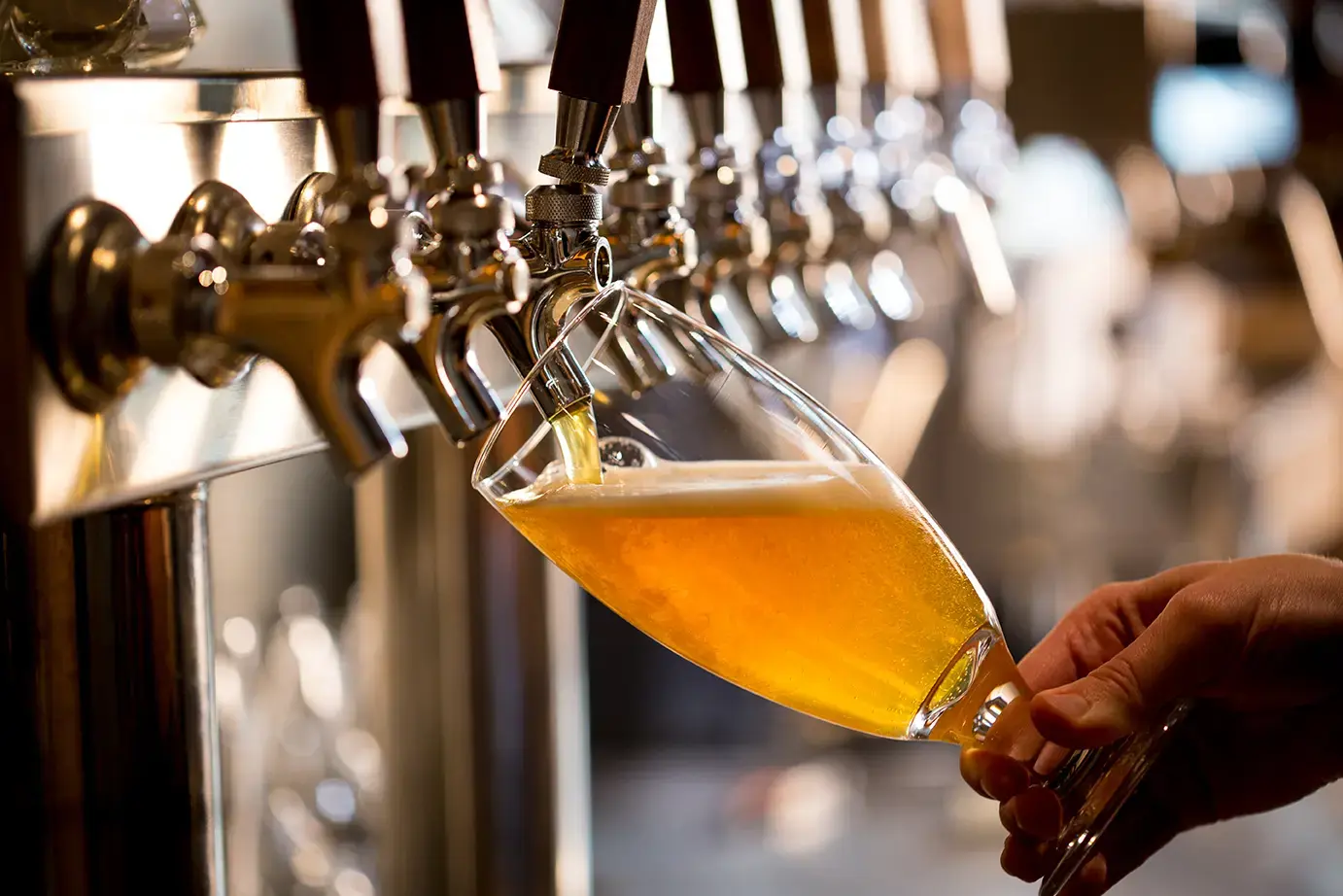 craft-beer-being-poured-from-beer-tap-slovenia.webp