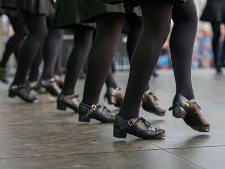 Close up of legs performing traditional Irish dance