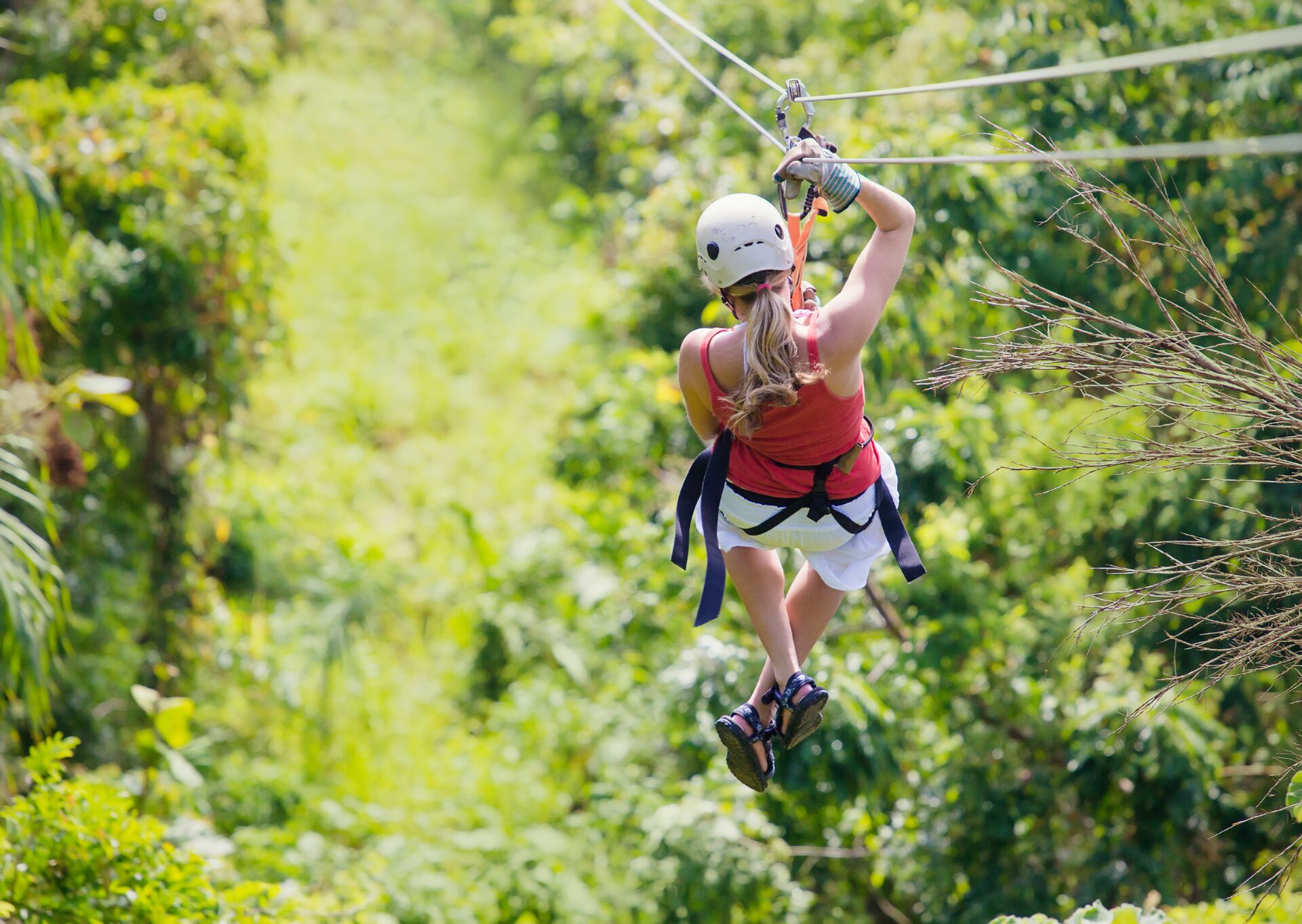 Woman Going On A Jungle Zipline Adventure in Costa Rica, South America
