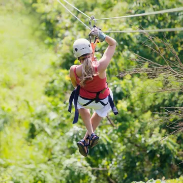 Woman Going On A Jungle Zipline Adventure in Costa Rica, South America