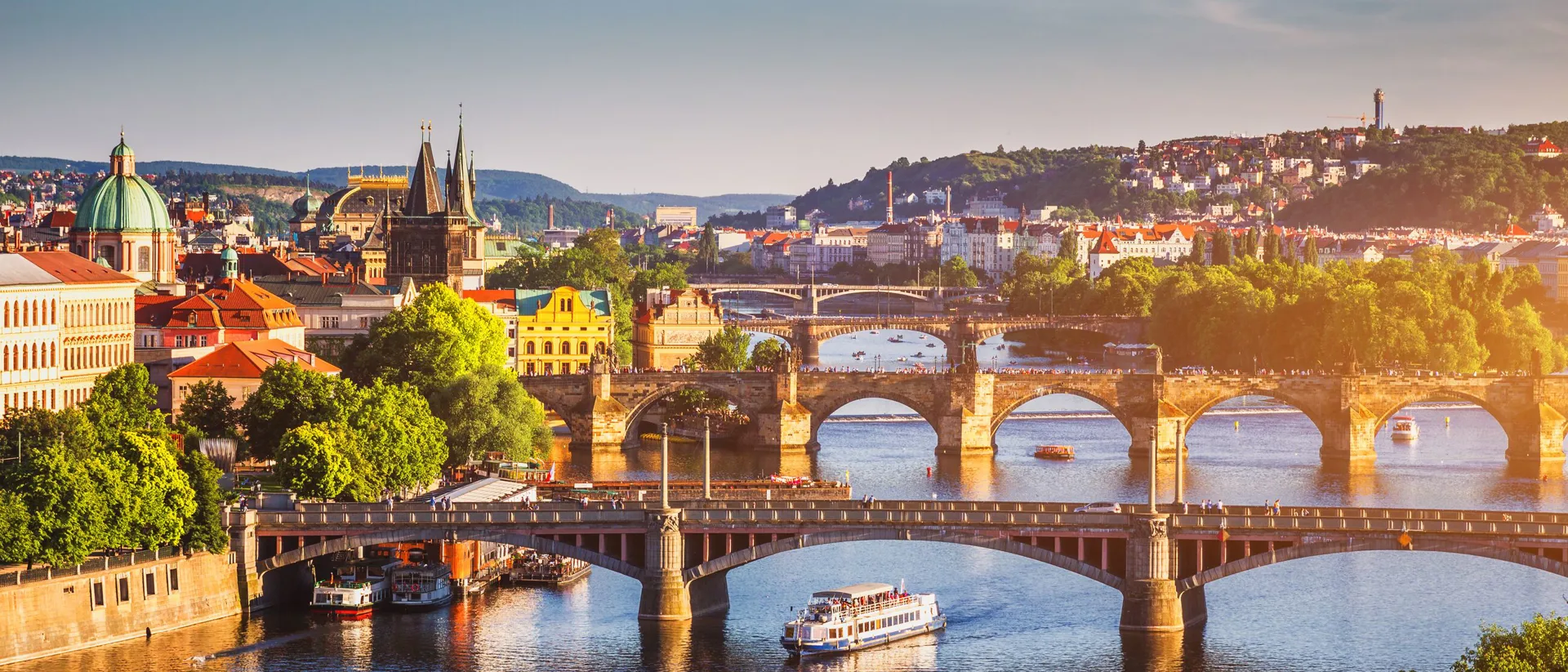 Old Town Pier Architecture And Charles Bridge Over Vltava River In Prague, Czech Republic