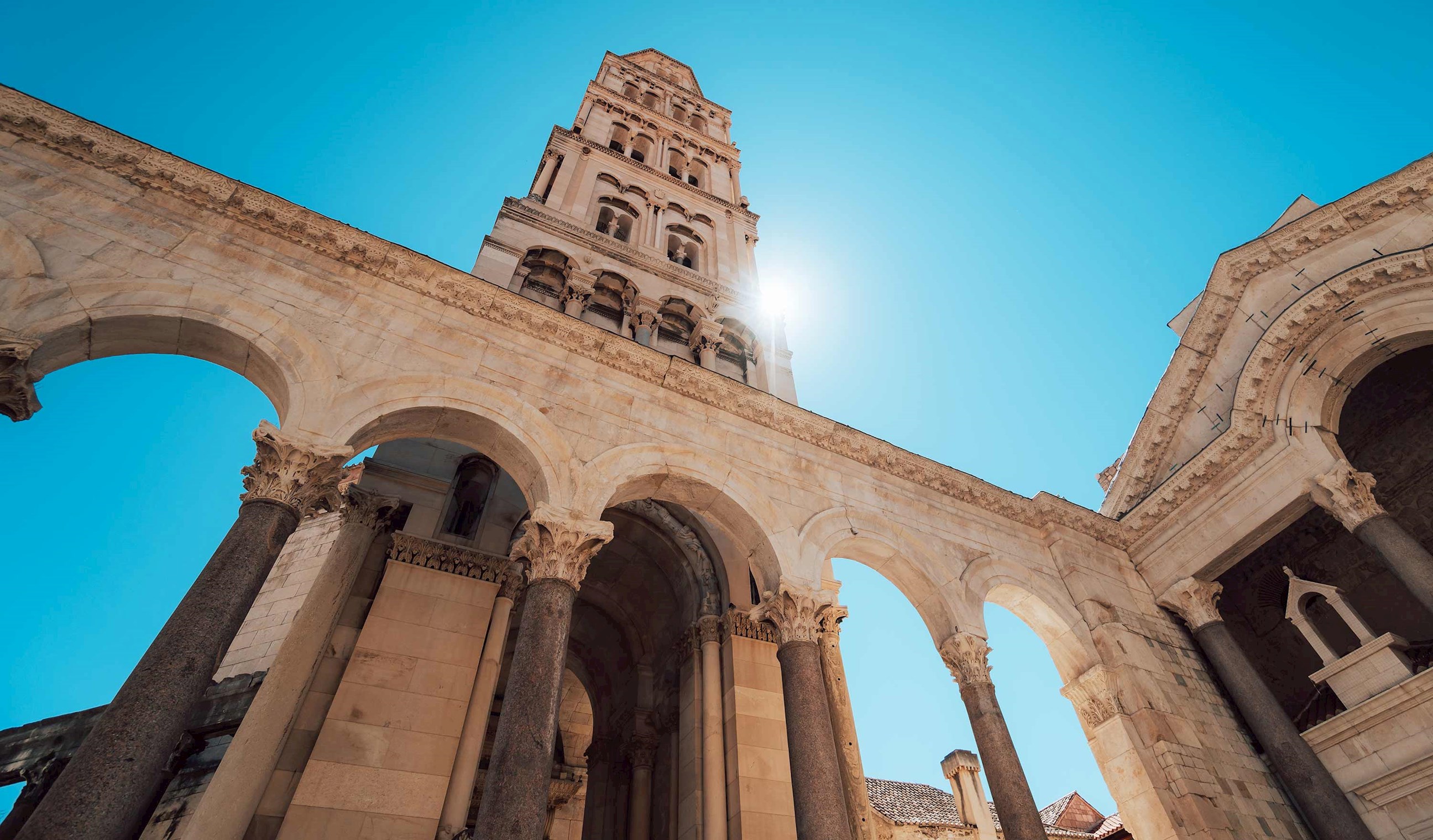 A view of a tower and arches in Split, Croatia