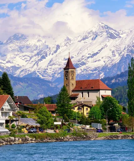 medium-brienz-town-near-interlaken-and-snow-covered-alps-mountains-switzerland-689979530.jpg