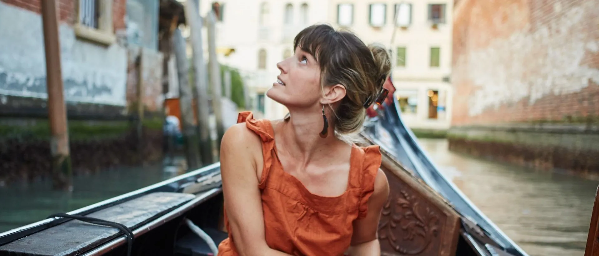 Woman in a Gondola in Venice, Italy