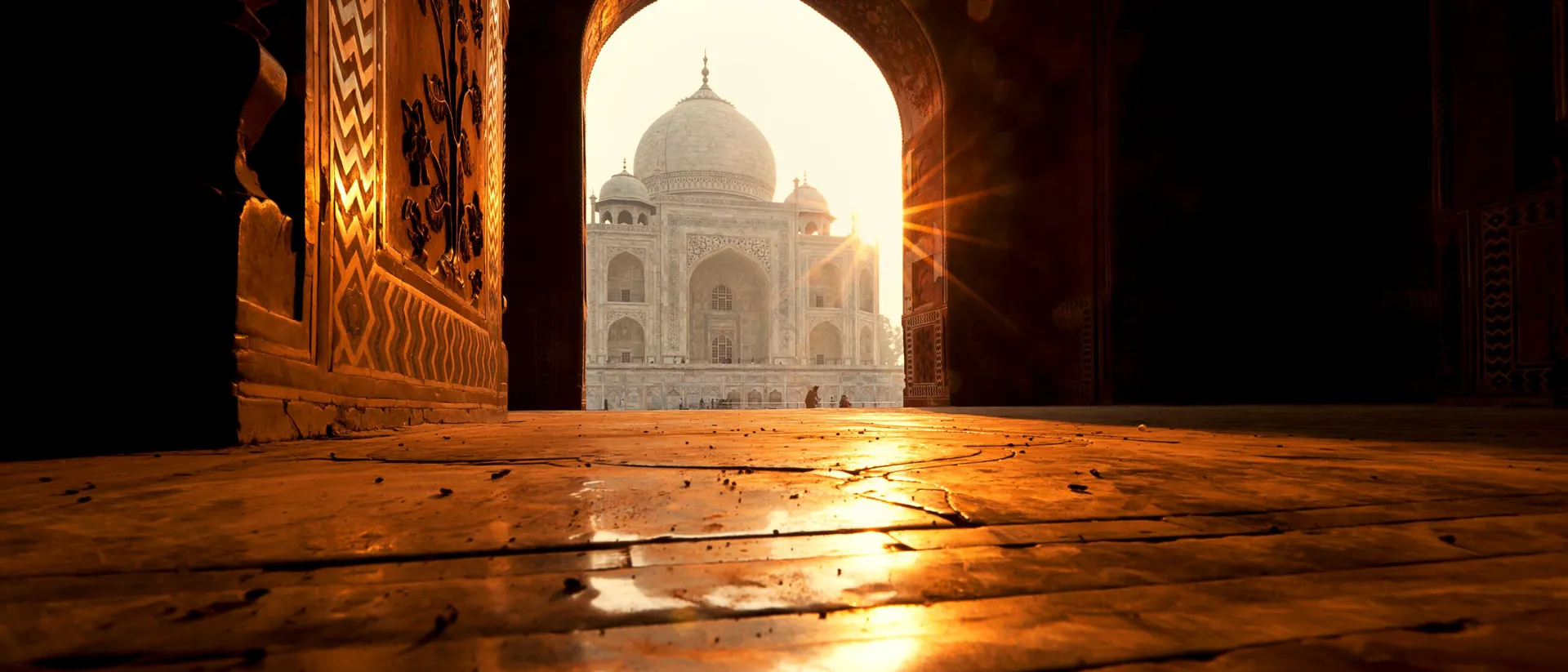 A view through a door of the Taj Mahal at sunrise, Agra, India