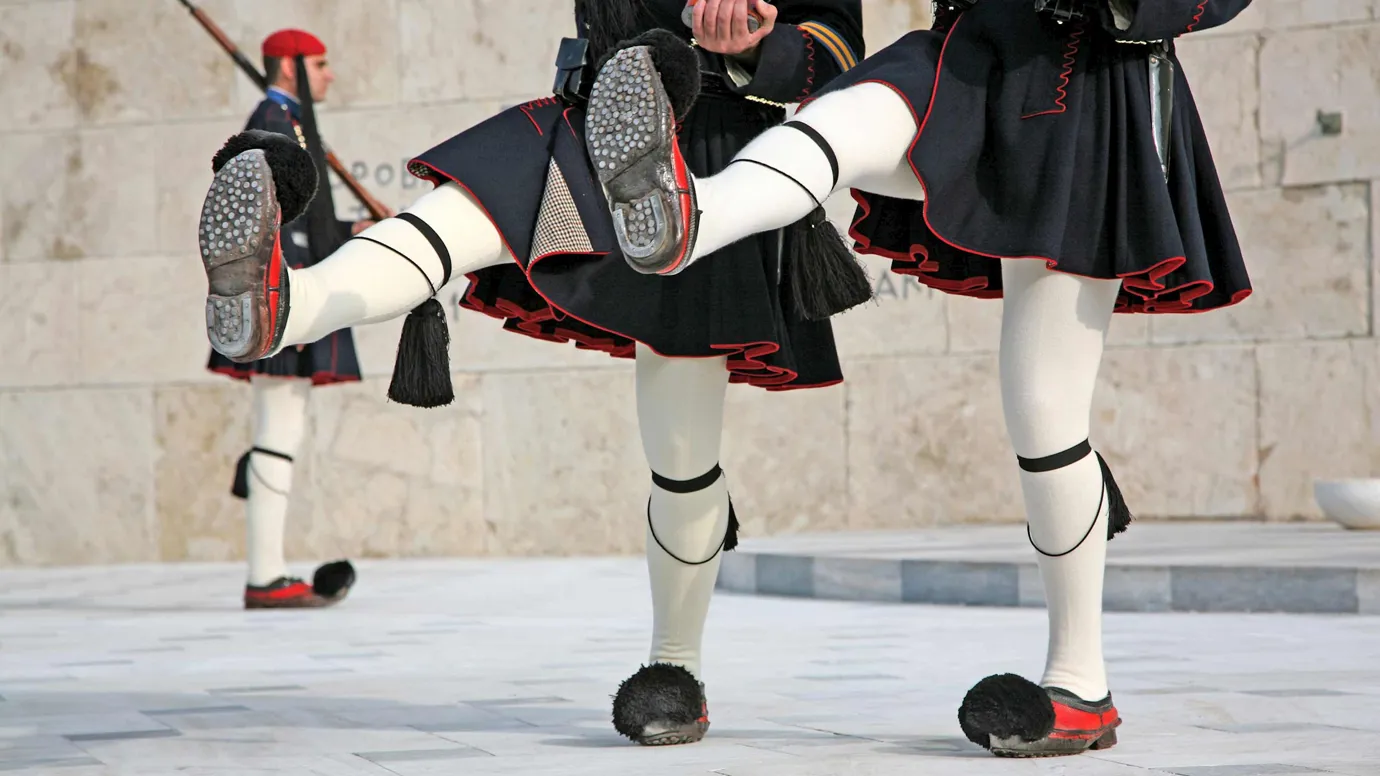 Close-up of Evzones guards’ traditional uniform during ceremonial march