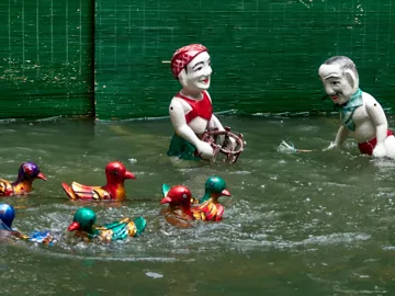 Decorative water puppets in a pool in Hanoi, Vietnam