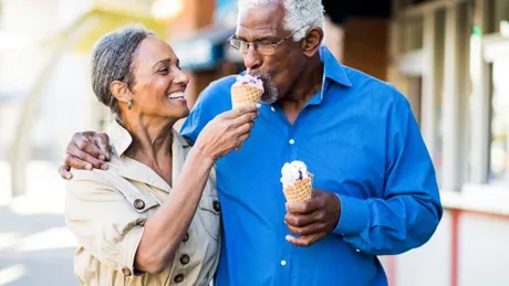 medium-african-american-senior-couple-on-the-town-with-ice-cream-898247826.jpg