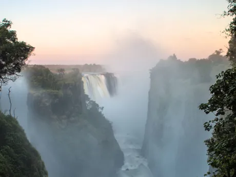 Victoria Falls, Zimbabwe producing a lot of spray rising up into the sky
