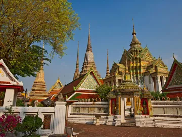 Ornate stupas and colourful temple structures at Wat Pho in Bangkok, Thailand