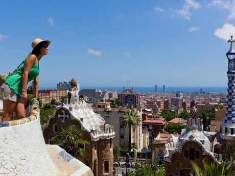 Lady looking out over Barcelona's skyline, Park Guell