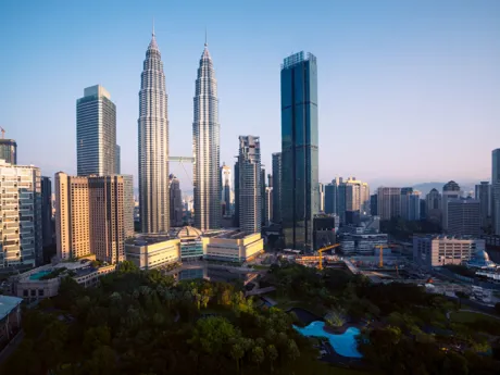 Tall skyscrapers, including the Petronas Twin Towers in Kuala Lumpur Malaysia
