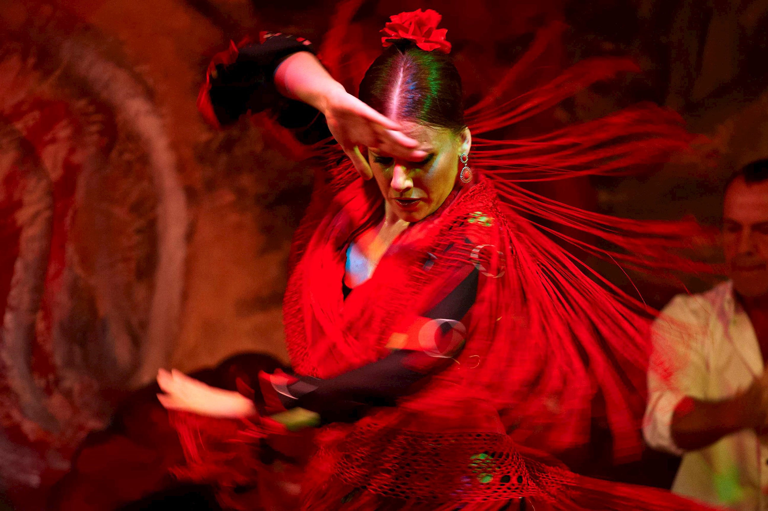 Flamenco Dancer in traditional red outfit in Seville, Spain