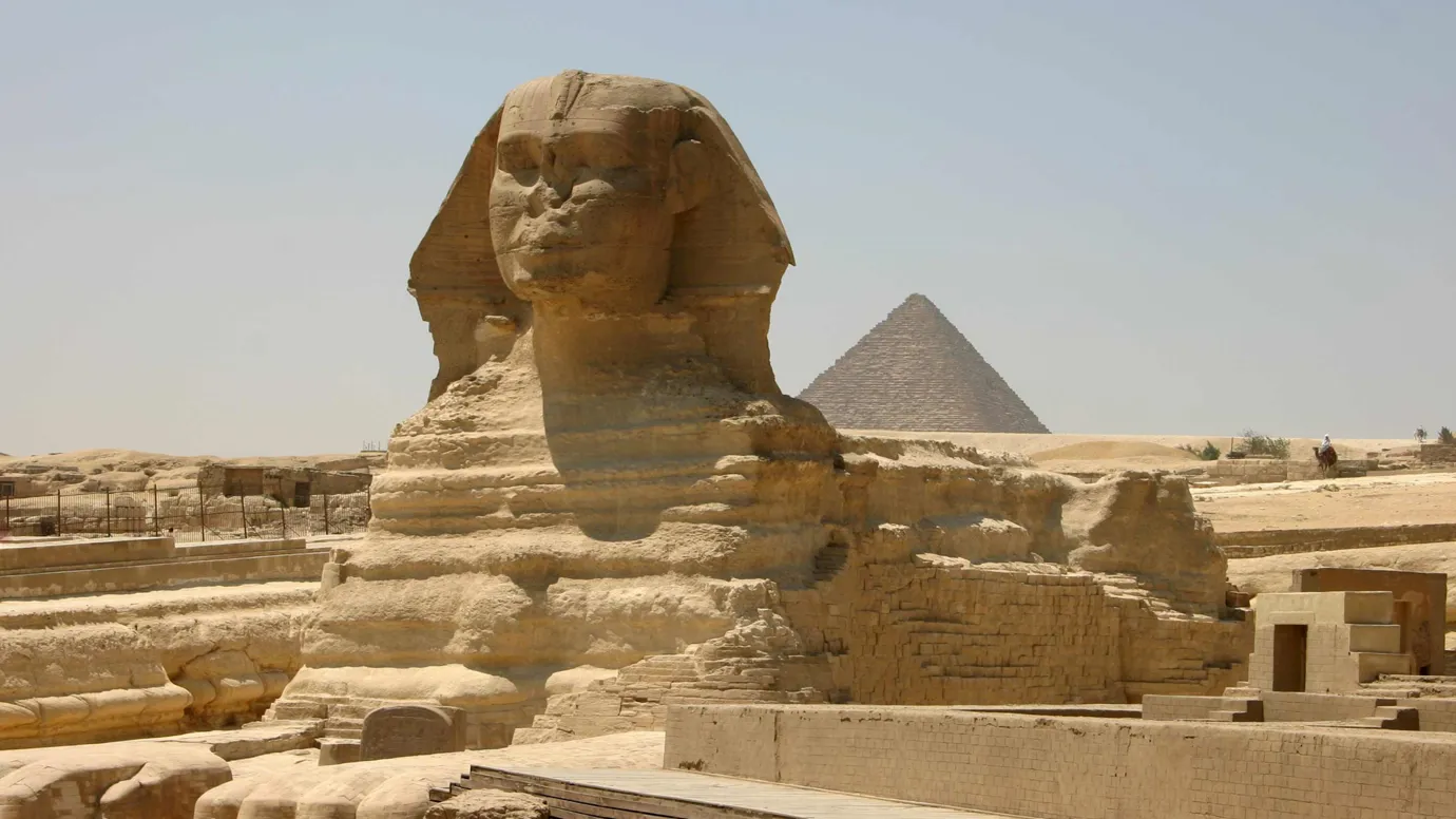 An external view of Sphinx statue on a sunny day in Cairo, Egypt