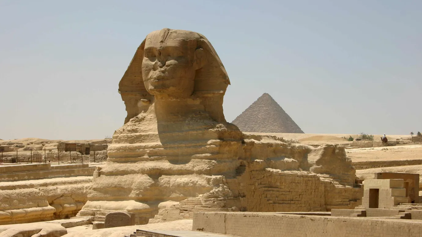 An external view of Sphinx statue on a sunny day in Cairo, Egypt