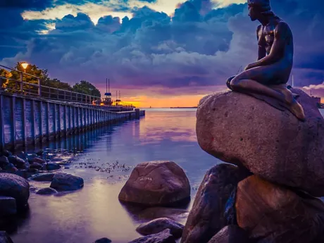 Scandinavia Copenhagen Little Mermaid Monument at sunset