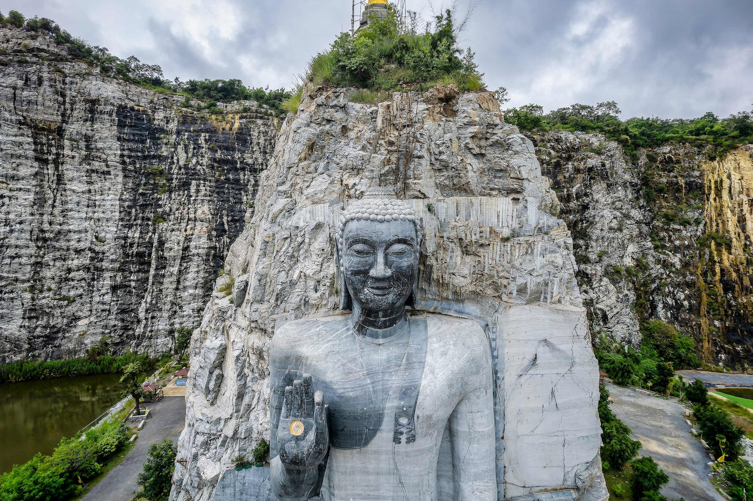 Stone Buddha statue in Kanchanaburi, Thailand