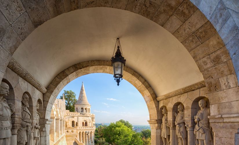 Statues at Fisherman Bastion with scenic view in background, Hungary, Budapest