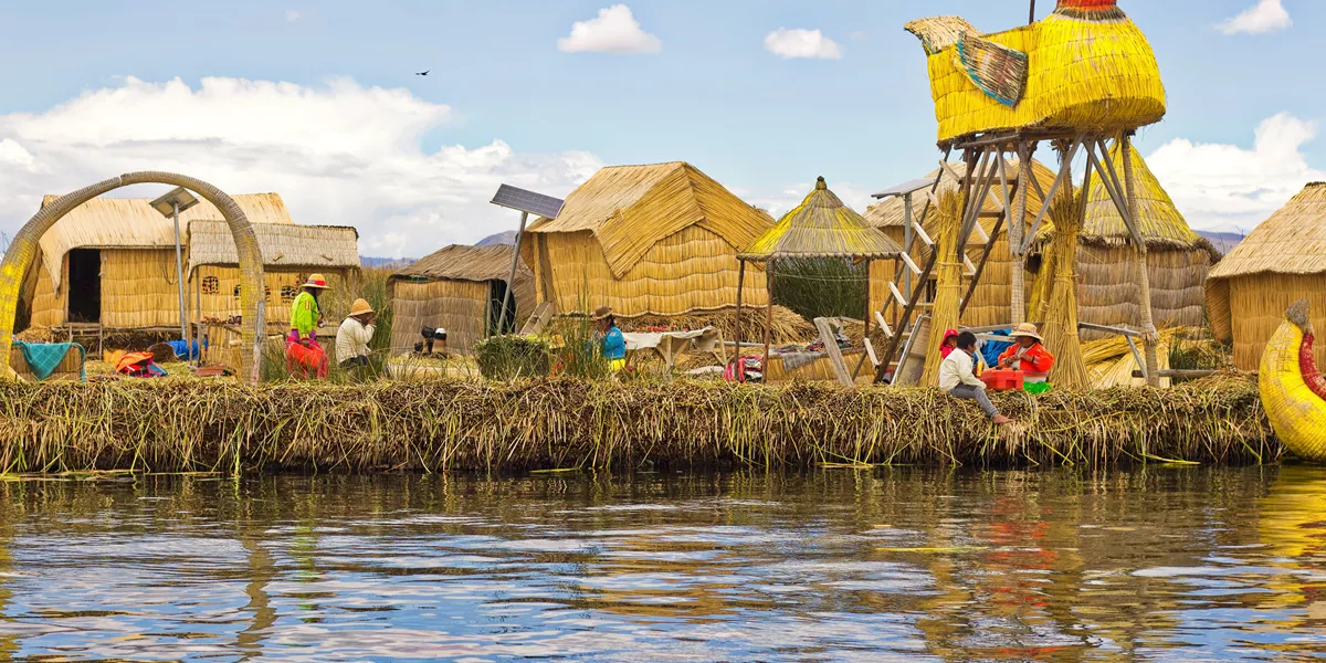 Buildings and sculptures built of straw next to the Lake Titicaca 