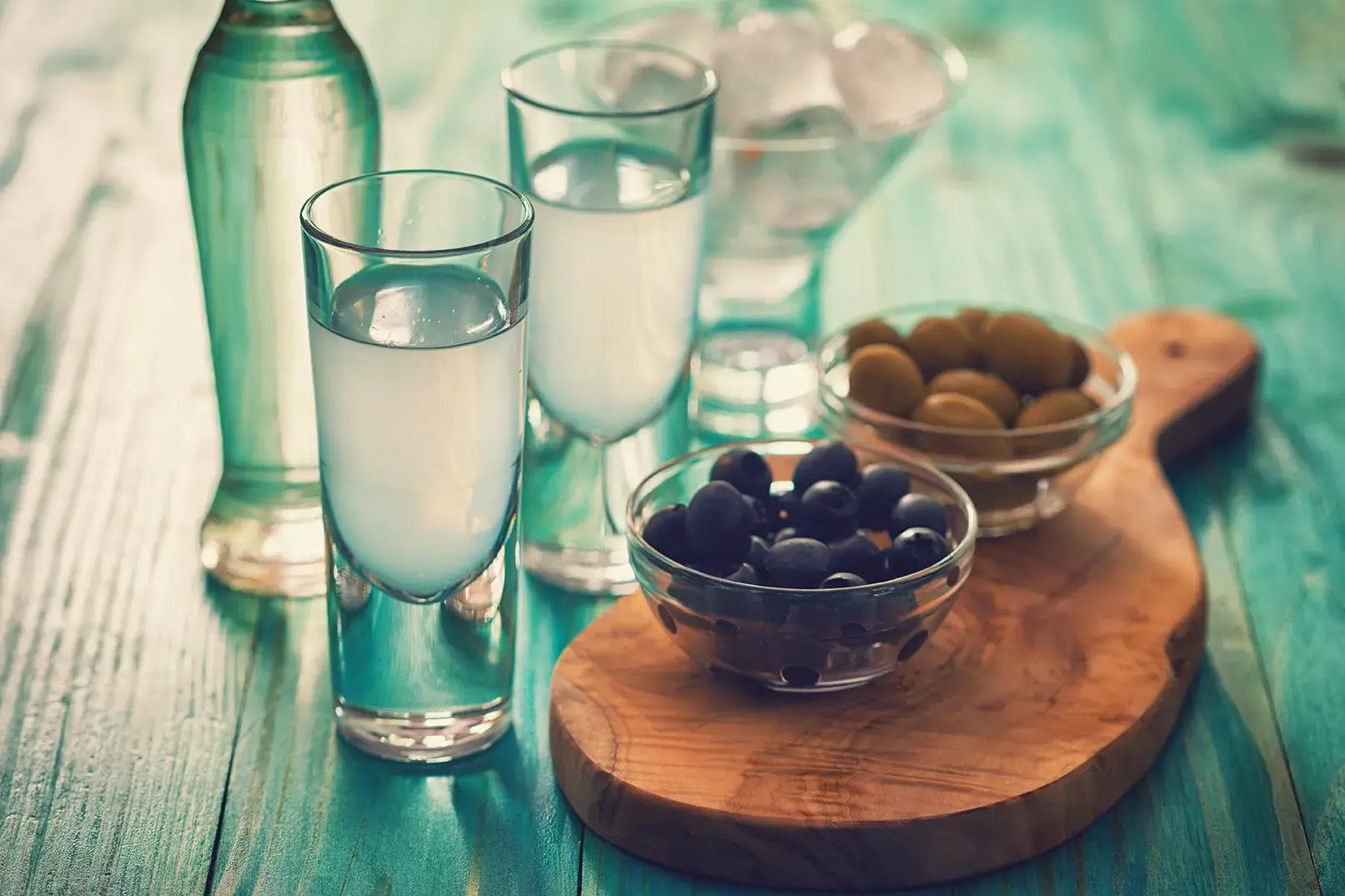 greek-ouzo-and-olives-697702246.webp
