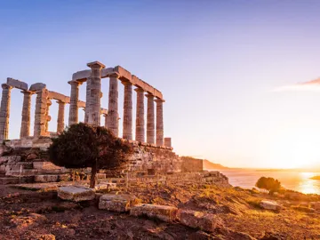Temple of Poseidon at sunset in Cape Sounion, Greece