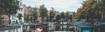 holland-amsterdam-canals-us-na-5386x3591.webp