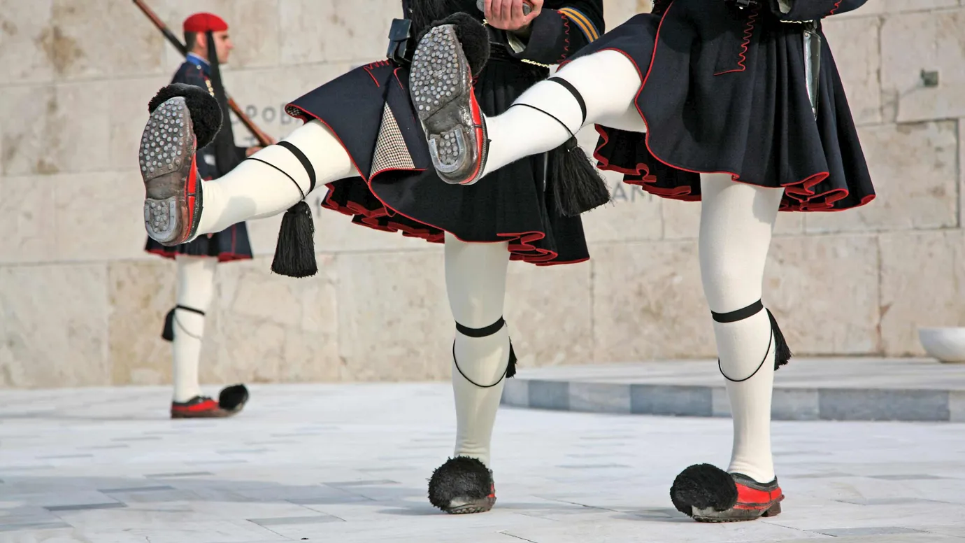 Close-up of Evzones guards’ traditional uniform during ceremonial march