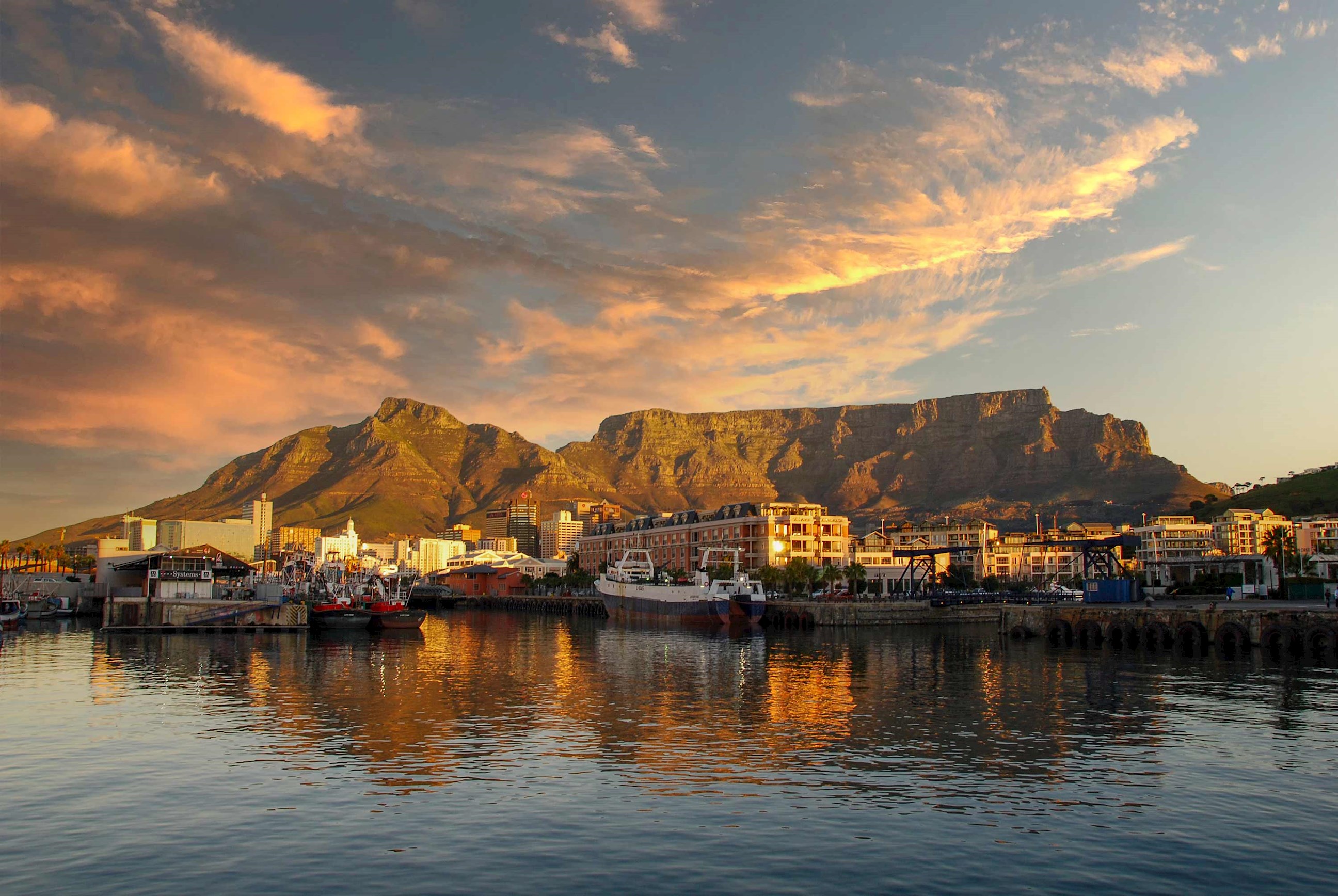 Sunset over bay with Table Mountain, Cape Town, South Africa