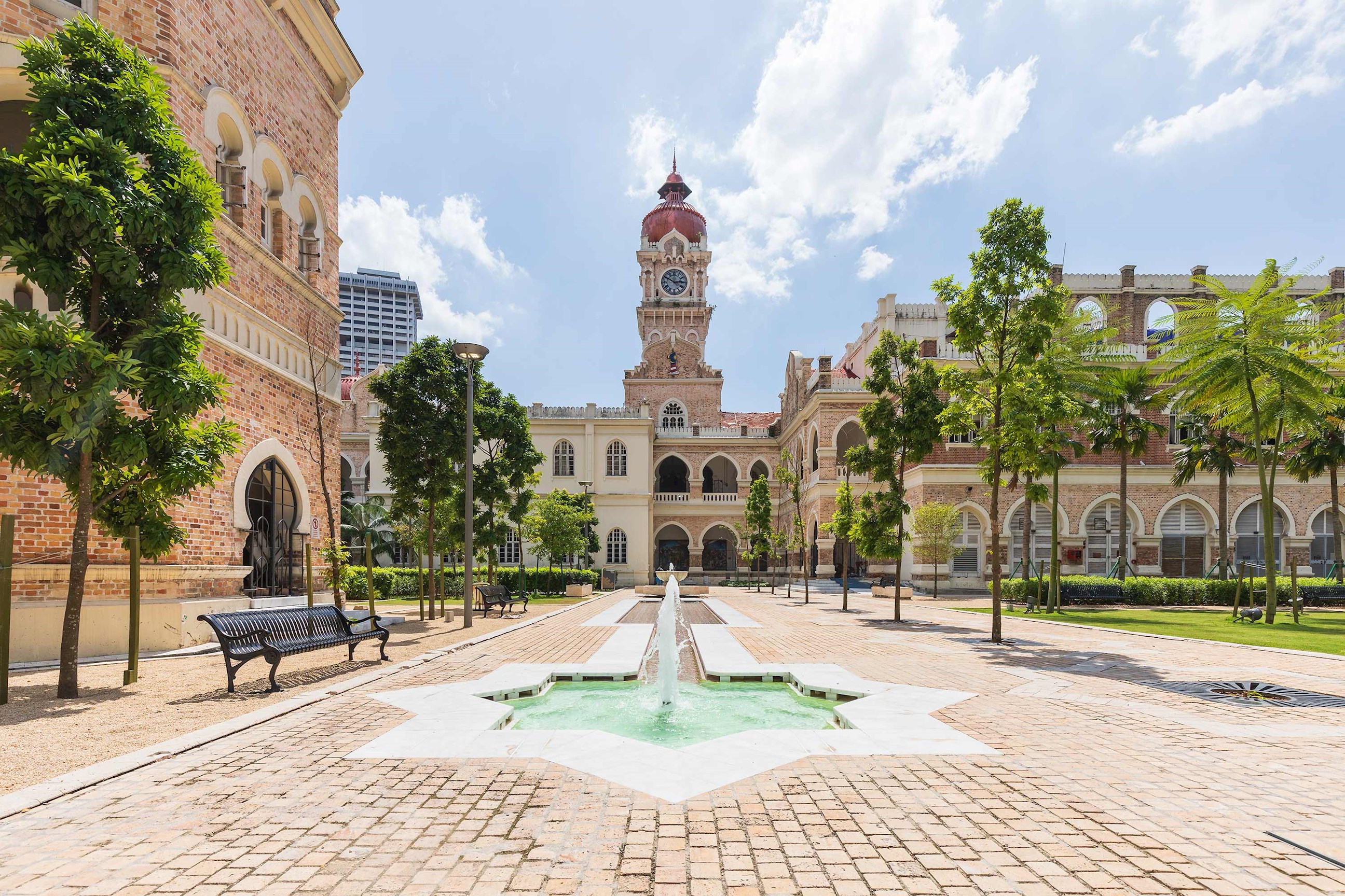 Exterior view of Sultan Abdul Samad Building with fountain in Kuala Lumpur, Malaysia