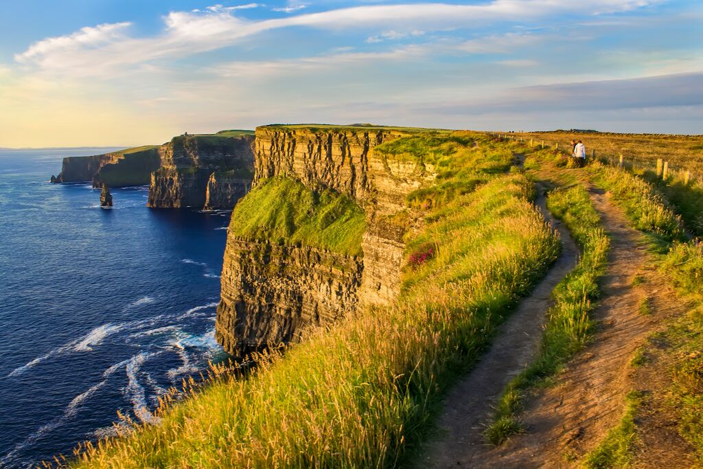 medium-tourists-at-the-cliffs-of-moher-famous-tourist-landmark-county-clare-ireland-1144162622.jpg