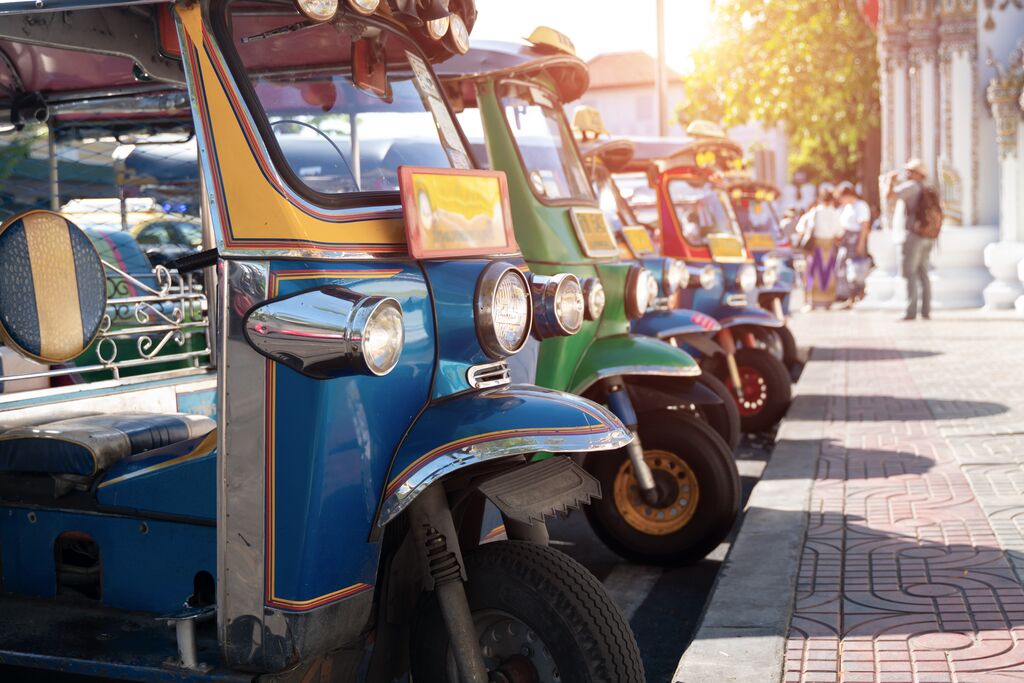 Jinrikishas lined up on street