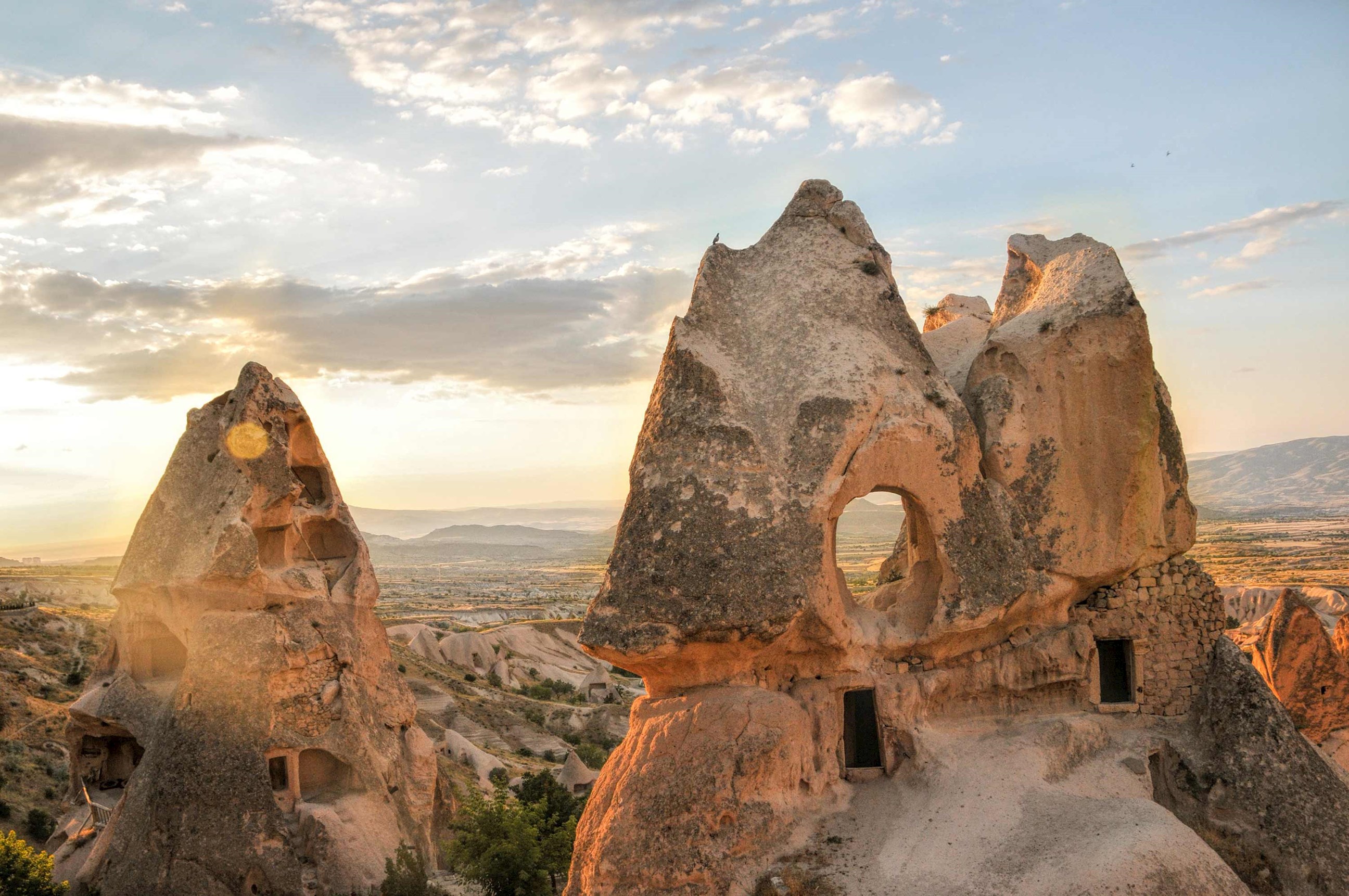 Fairy chimneys and cave dwellings at sunset in Cappadocia, Turkey