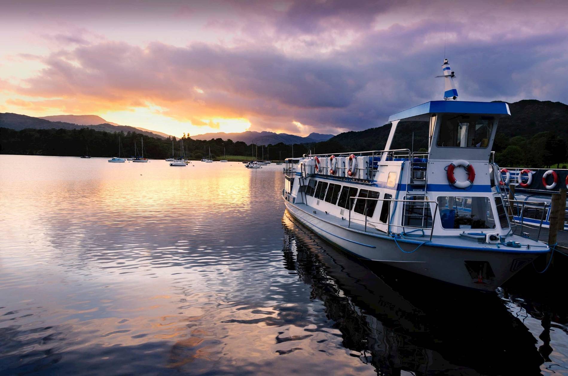 Boat on a cruise lake in Windermere, England