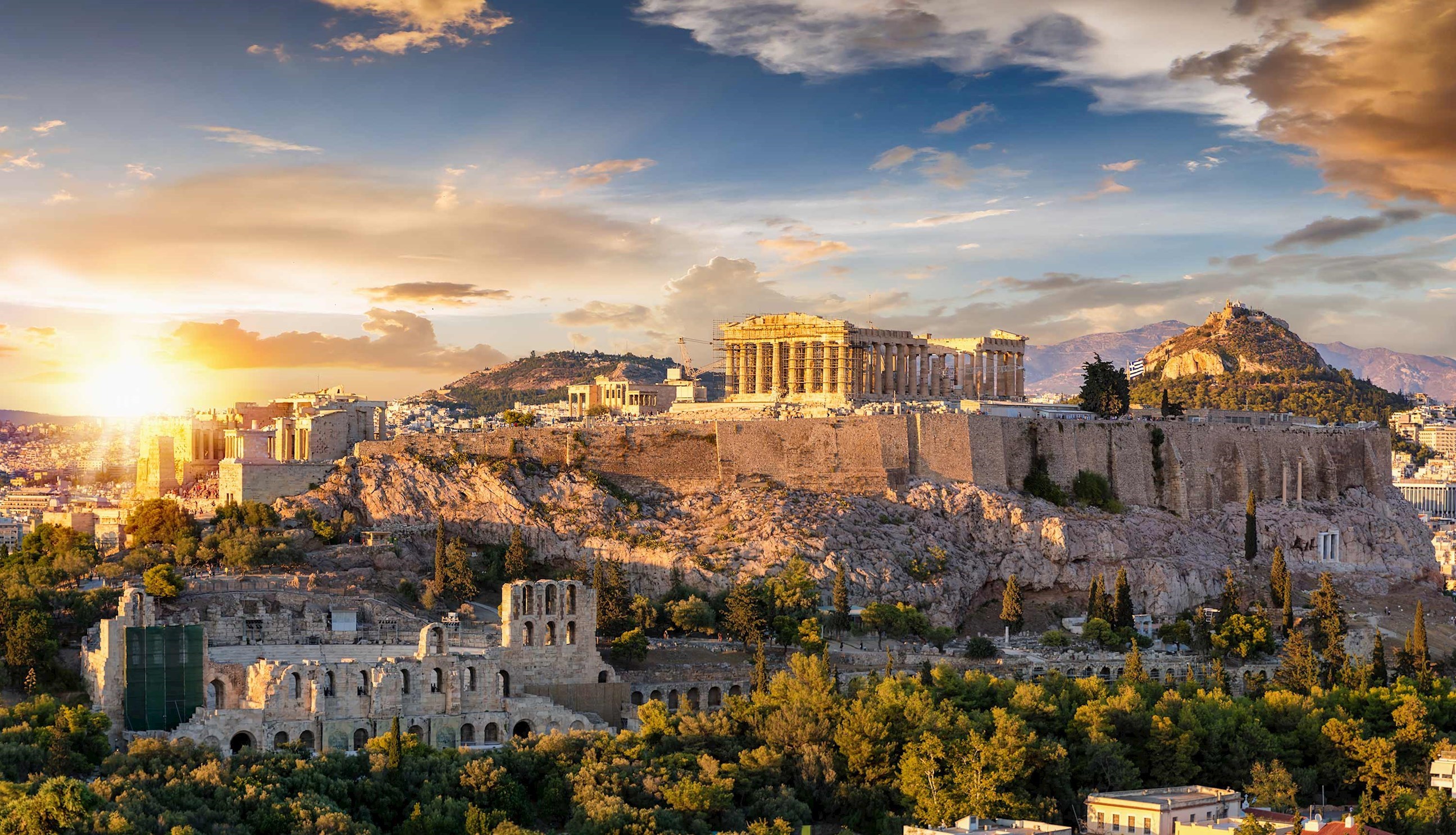 Panoramic view of Acropolis and Parthenon at sunset in Athens, Greece