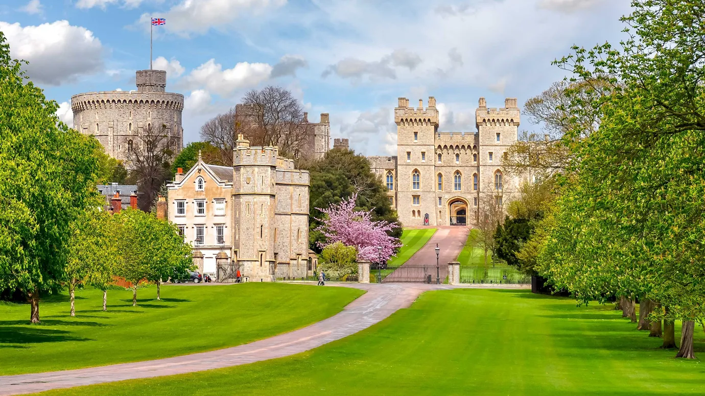 A scenic view of Windsor Castle against the blue sky in Windsor, England