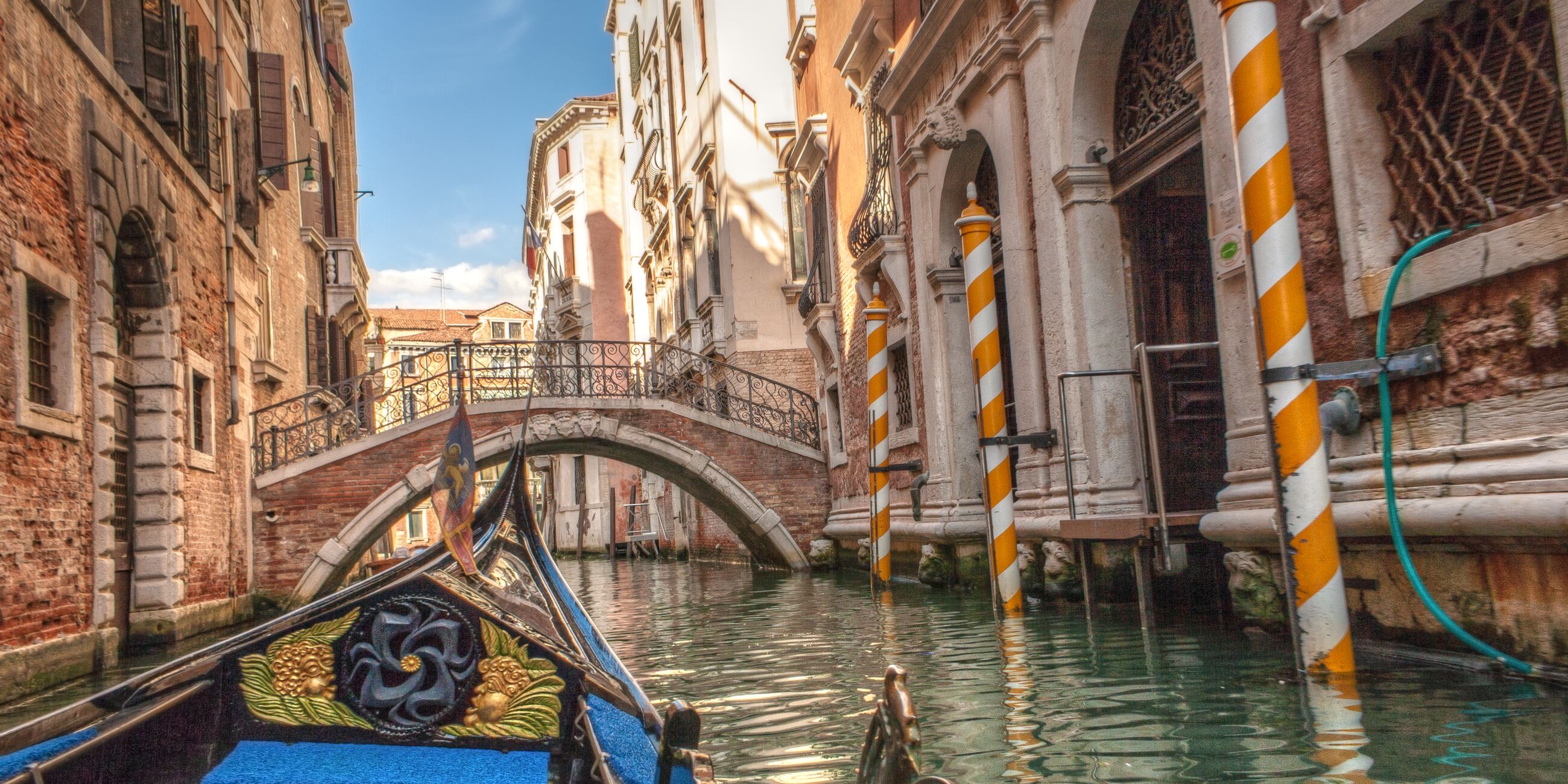 Gondola sailing through the canals of Venice, Italy