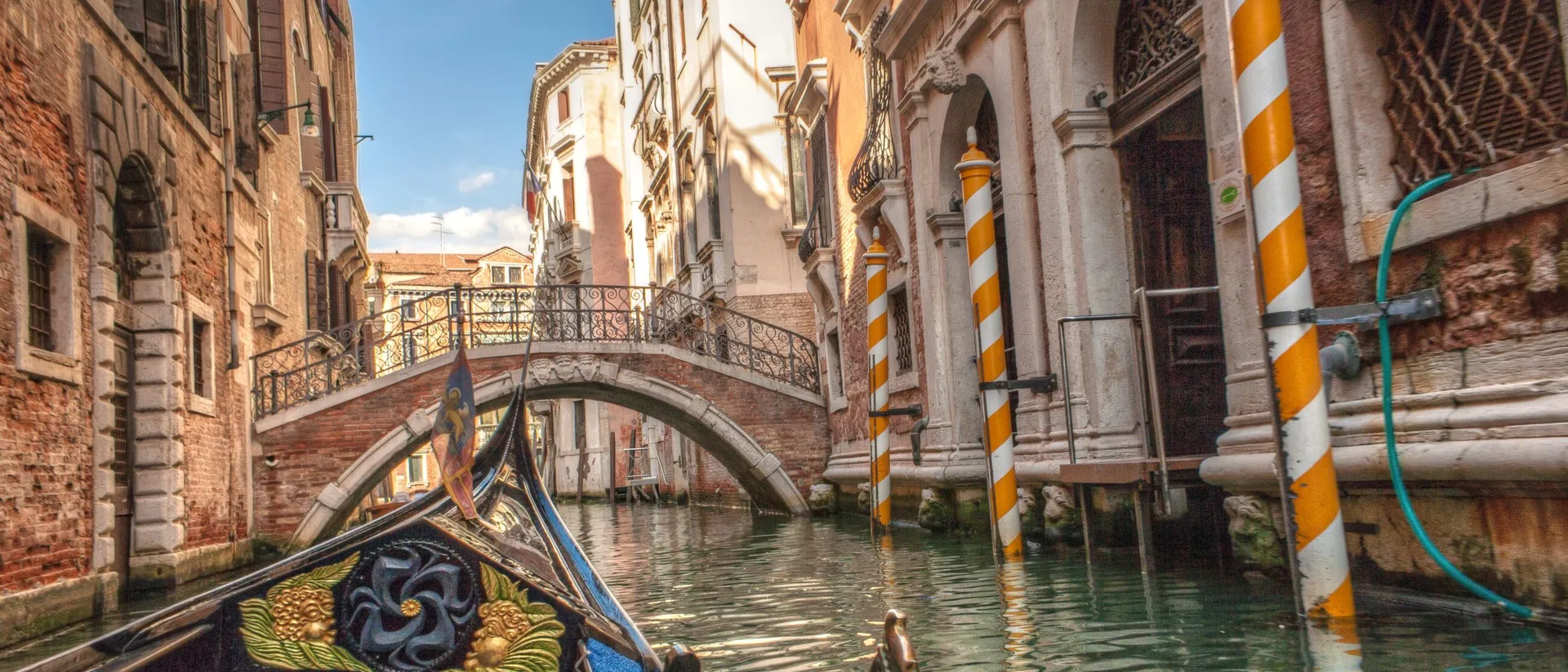 Gondola sailing through the canals of Venice, Italy