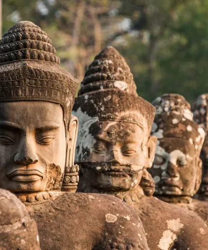 medium-south-gate-of-angkor-thom-temple-in-angkor-archaeological-park-cambodia-639405474.jpg