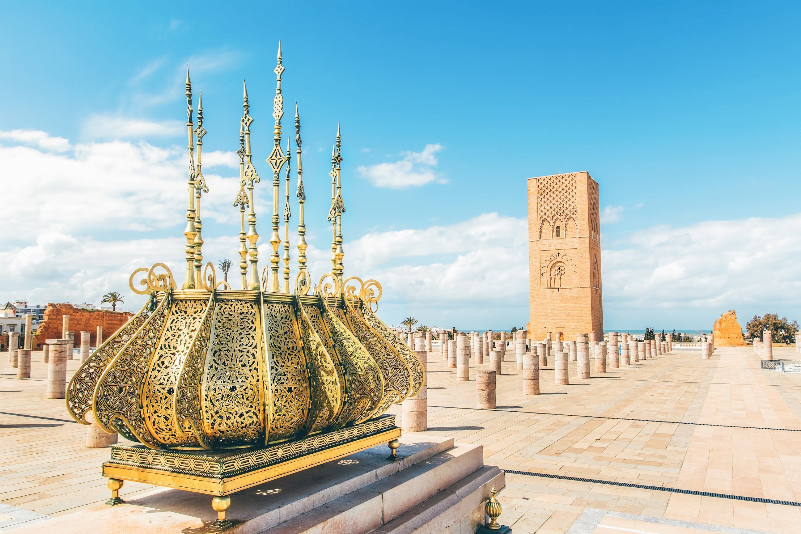 Hassan Tower with golden lantern and stone columns in Rabat, Morocco