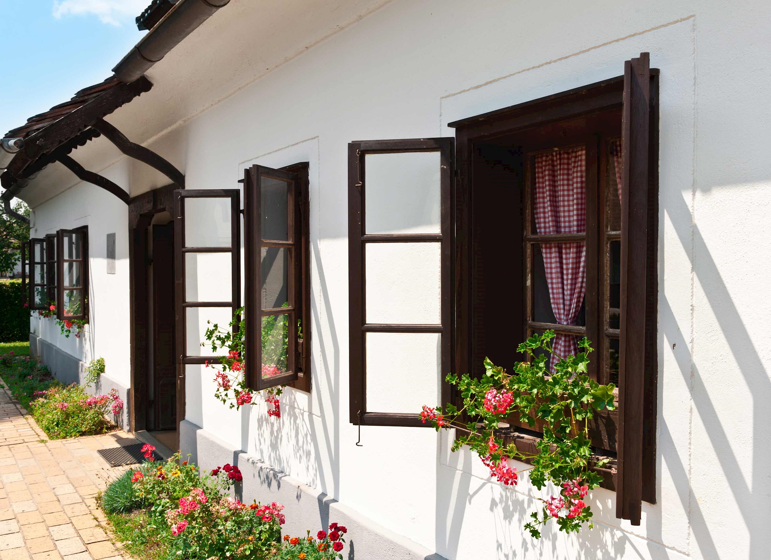 Traditional house with open windows in Kumrovec, Croatia