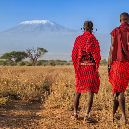 Warriors From Maasai Tribe Looking At Mount Kilimanjaro Kenya Africa 