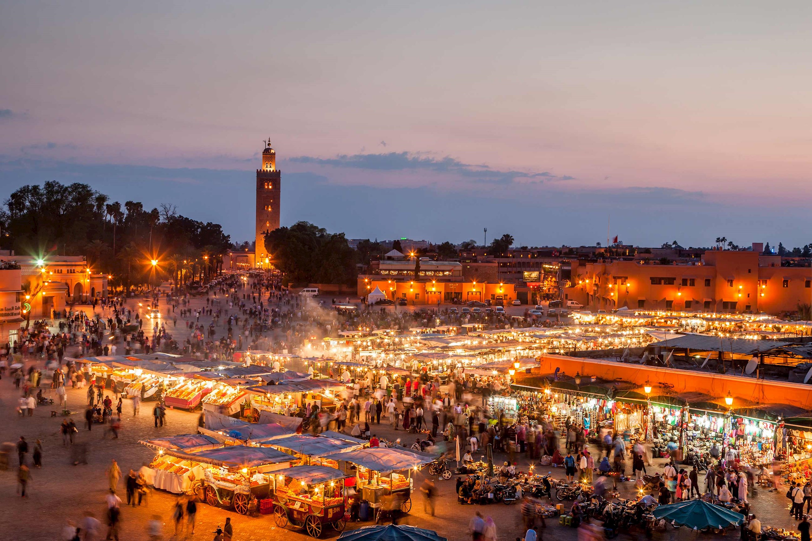 Jemaa el-Fnaa square with bustling market stalls in Marrakech, Morocco