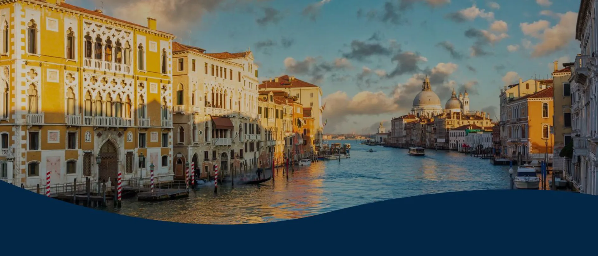 Grand canal venice at suset blue skies with a few clouds