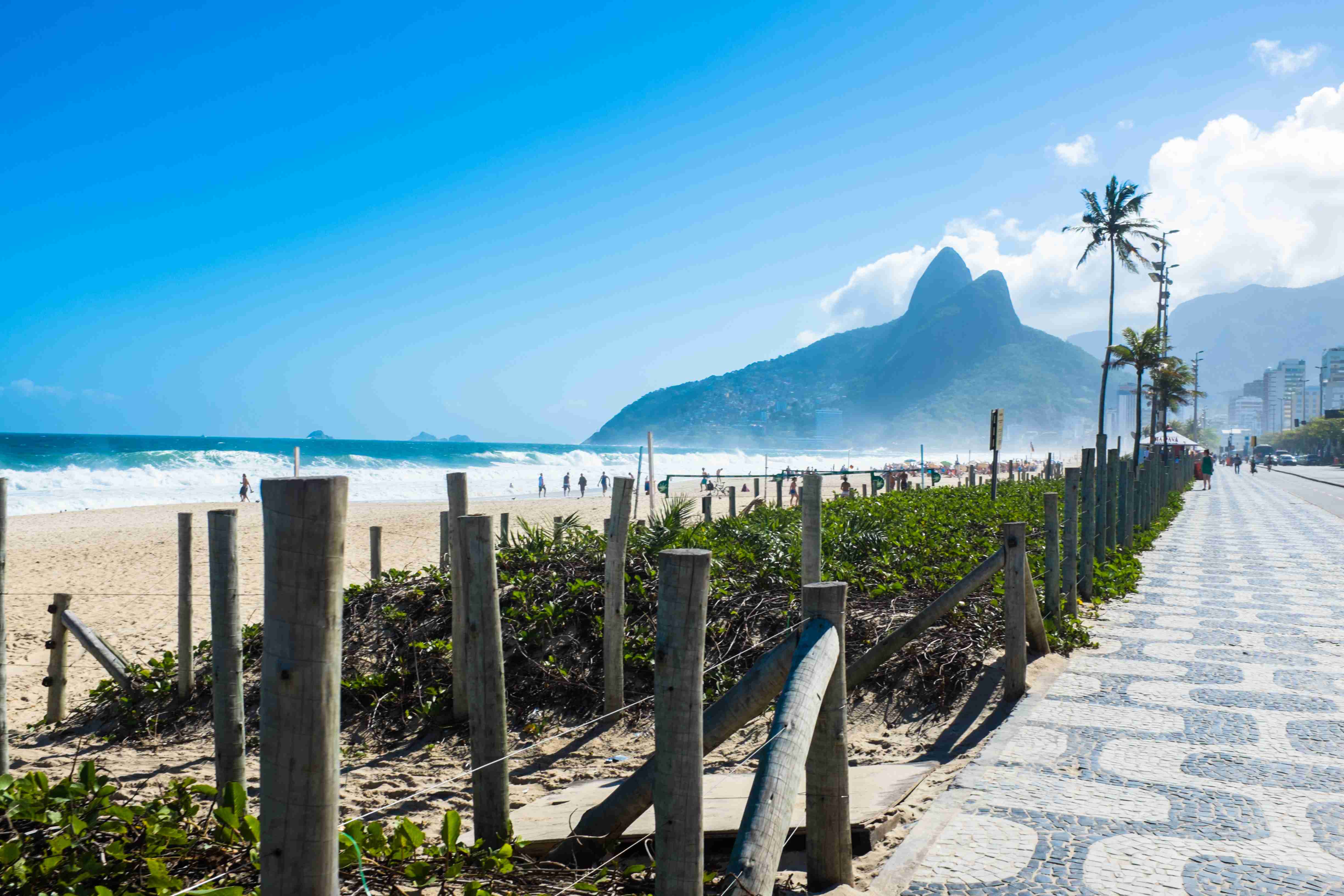 Ipanema beach in Rio de Janeiro, Brazil with the sugar loaf mountain in the background