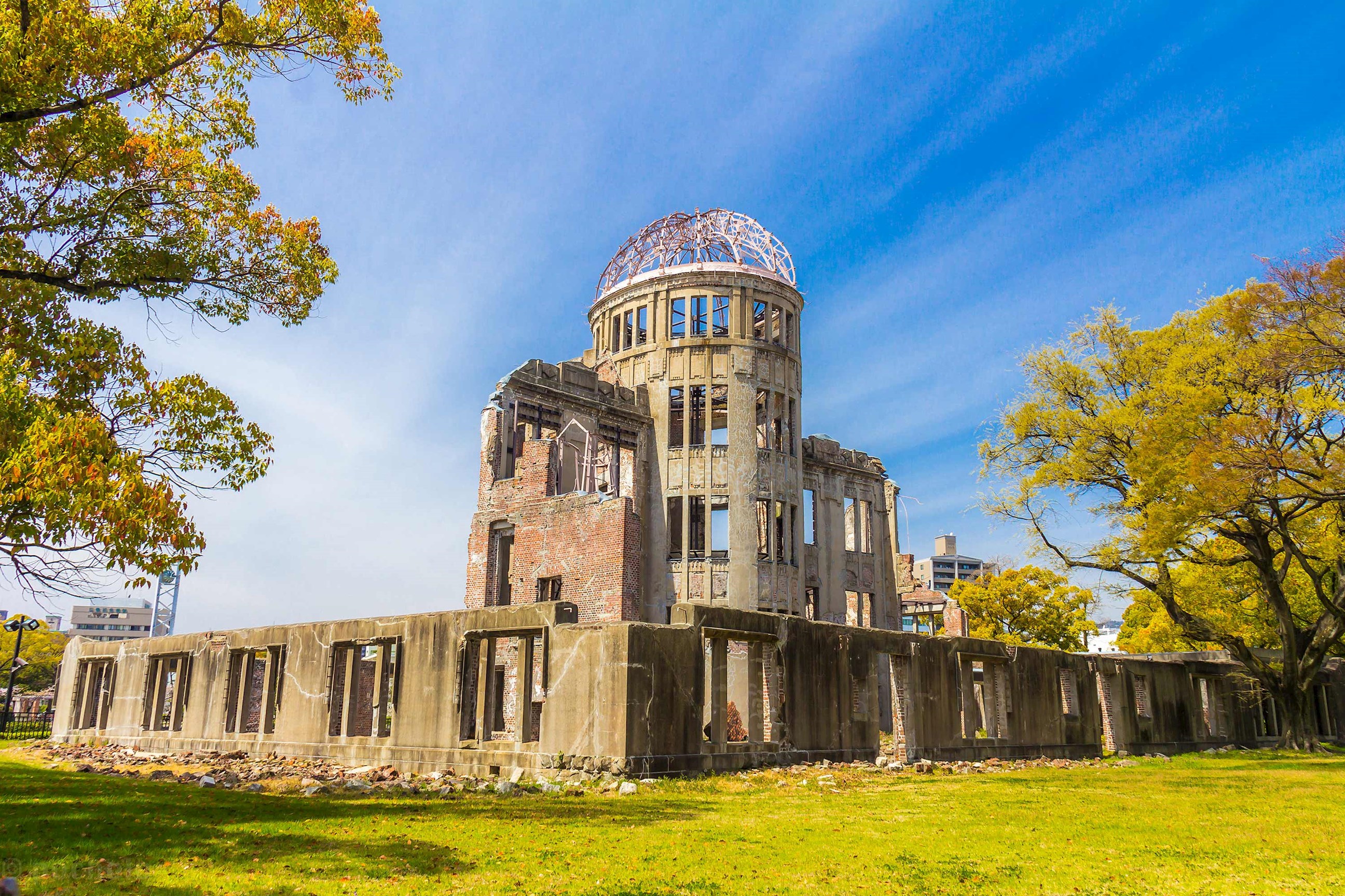 Exterior view of Hiroshima Peace Memorial Dome surrounded by trees