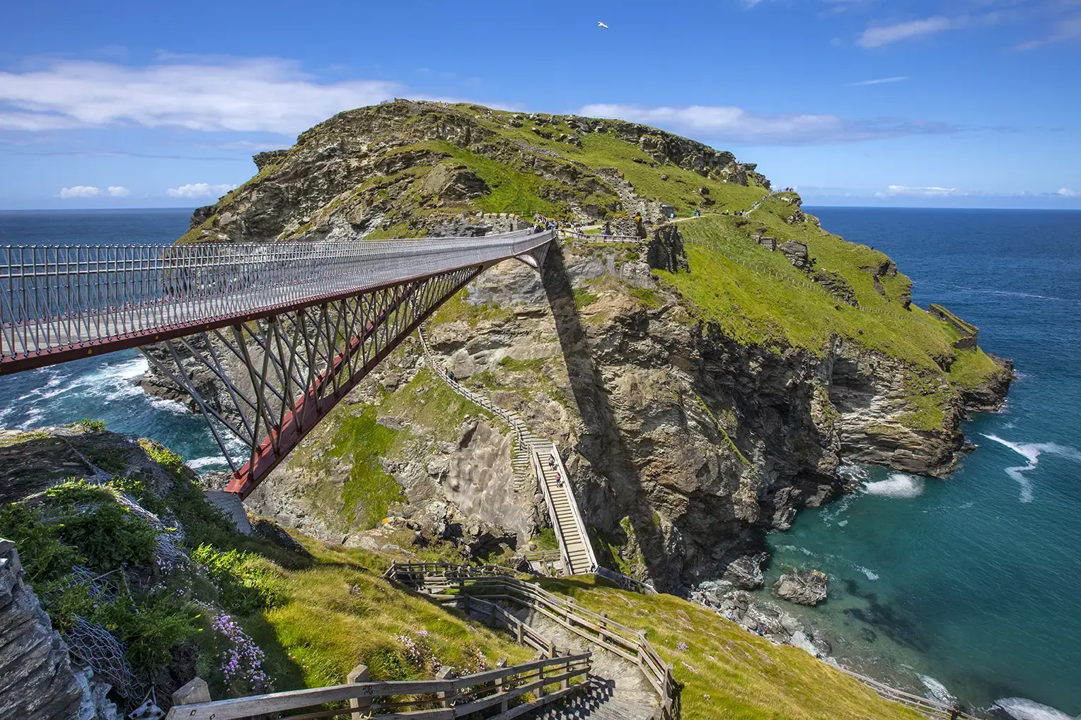 footbridge-at-tintagel-castle-in-cornwall-uk-1332308099.webp