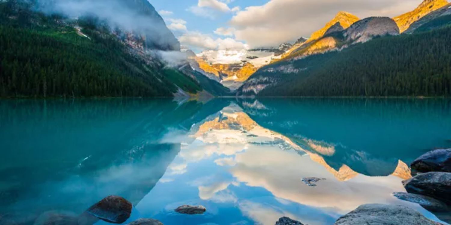 Panoramic View Of Lake And Mountains Against Sky