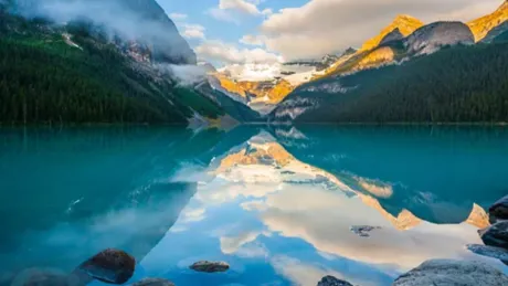 Panoramic View Of Lake And Mountains Against Sky